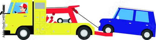 レッカー車を運転する男性作業員