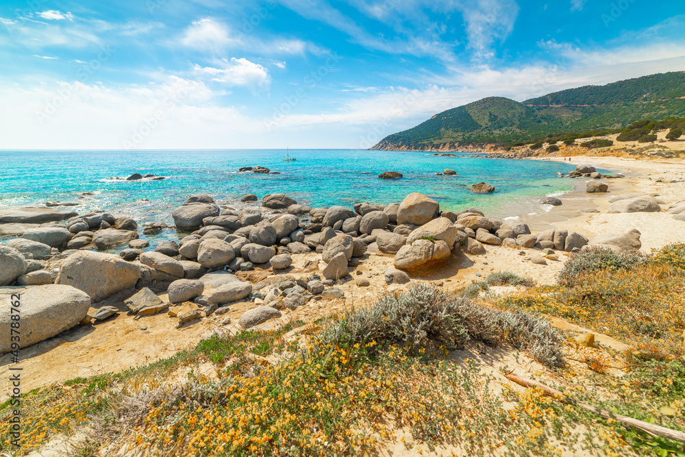 Rocks and sand in Porto Sa Ruxi beach in springtime Rocks and sand in Porto Sa Ruxi beach in springtime