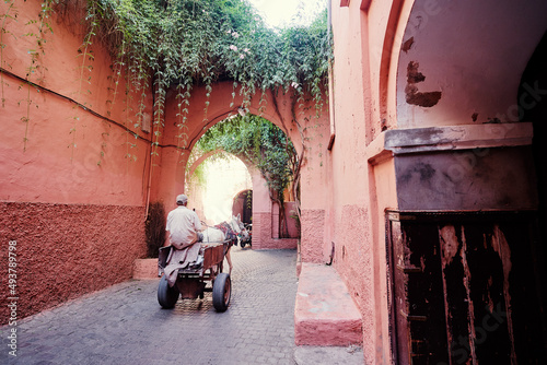 Travel by Morocco. Red wall of moroccan streets.