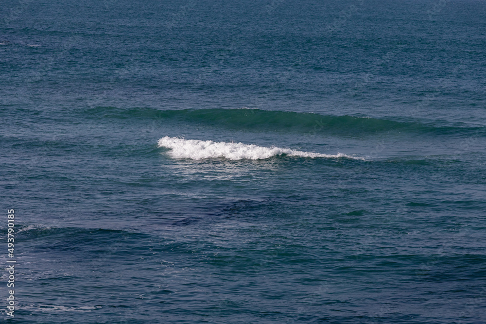 waves on the beach in portugal