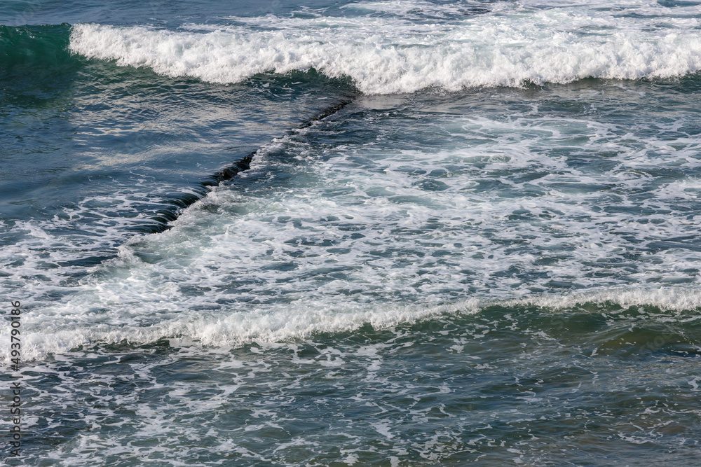 waves on the beach in portugal