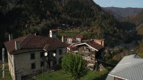 Wallpaper Mural Aerial 4K footage of houses made of wood and stone in local architectural style in Rize. Torontodigital.ca