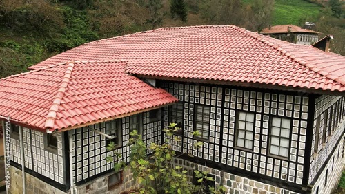 Wallpaper Mural Aerial 4K footage of houses made of wood and stone in local architectural style in Rize. Torontodigital.ca