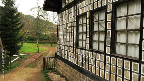 Wallpaper Mural Slider dolly 4K shot of houses made of wood and stone in local architectural style in Rize. Torontodigital.ca