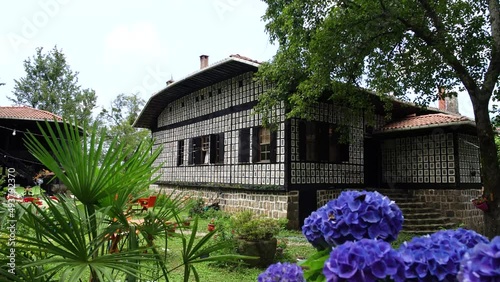 Wallpaper Mural Slider dolly 4K shot of houses made of wood and stone in local architectural style in Rize. Torontodigital.ca