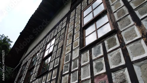 Wallpaper Mural Slider dolly 4K shot of houses made of wood and stone in local architectural style in Rize. Torontodigital.ca