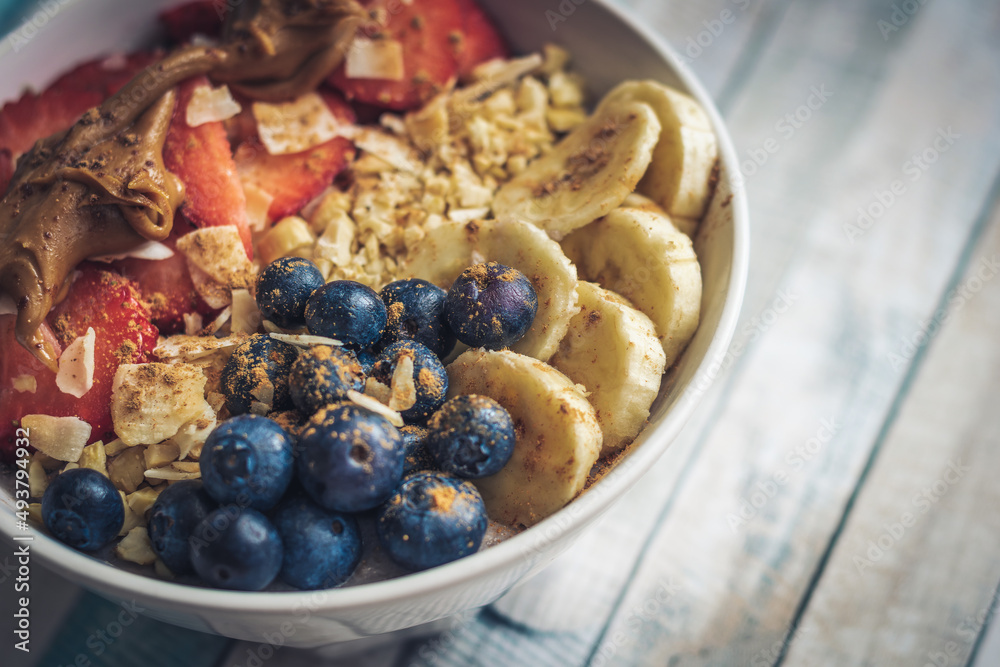 Buckwheat porridge with blueberries, strawberries banana and caramel cream Buckwheat porridge with blueberries, strawberries banana and caramel cream