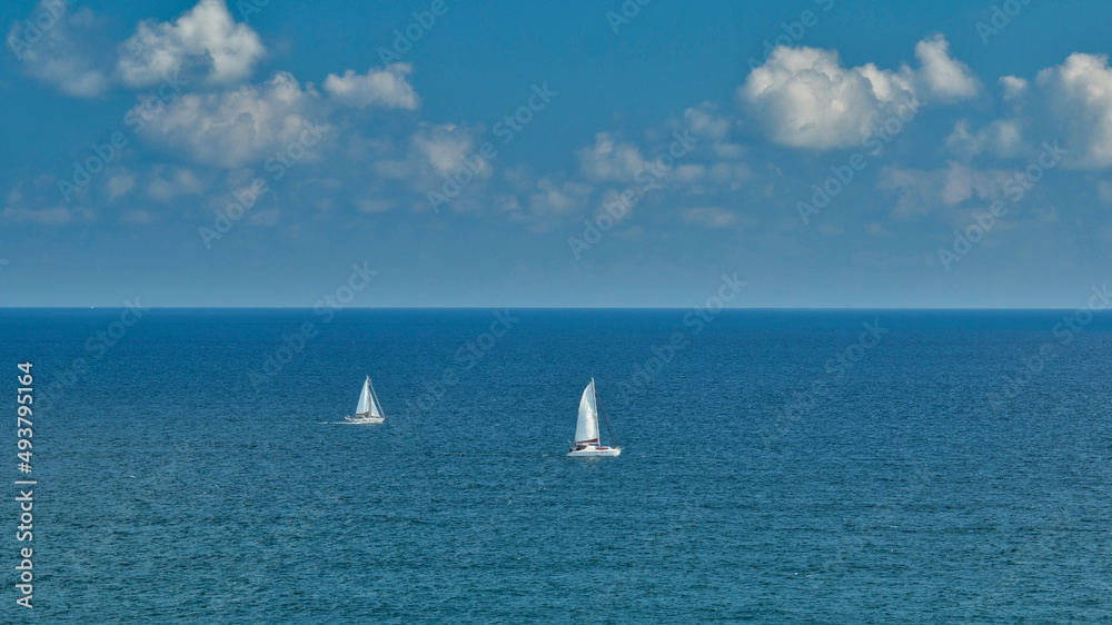 Two sailboats on a sunny day in Florida