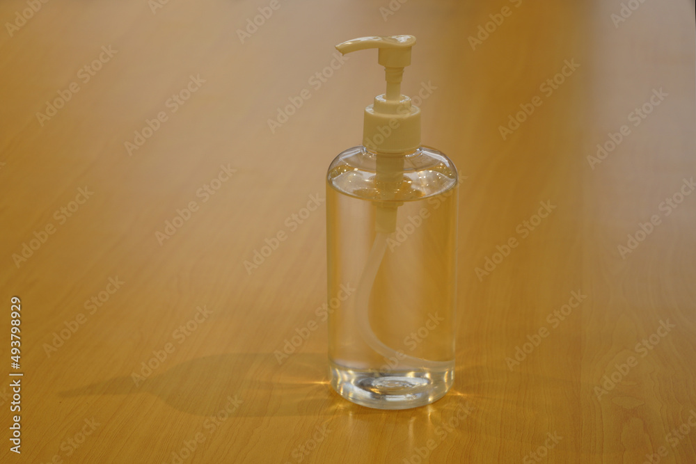 Hand sanitizer liquid that is placed on the table for anyone to implement health protocols by washing hands Hand sanitizer liquid that is placed on the table for anyone to implement health protocols by washing hands