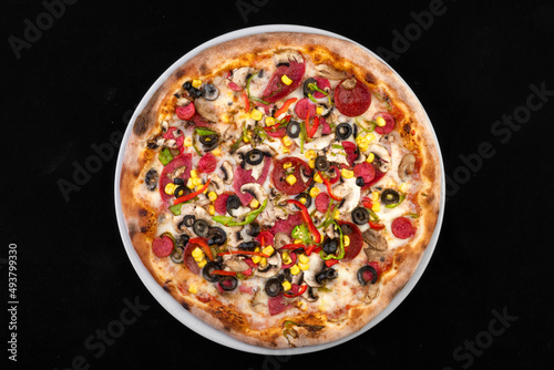 Delicious Italian Pizza On The Black Background