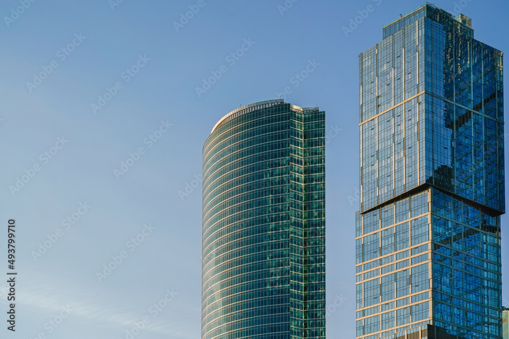 Skyscrapers in the business center, financial district, sunny day, blue sky, empty space, Moscow city, Russia. Skyscrapers in the business center, financial district, sunny day, blue sky, empty space, Moscow city, Russia.