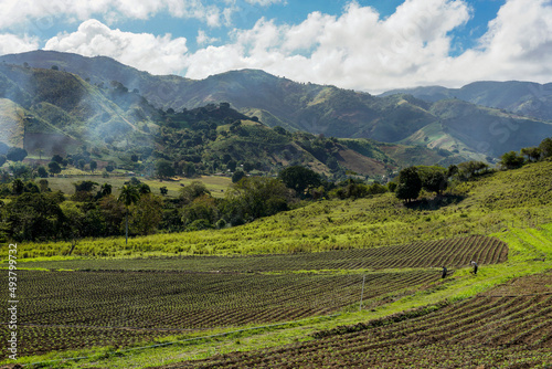 Dramatic image of agricultural fields and farms in the Caribbean mountains of the Dominican Republic.