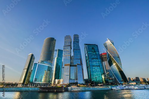 Skyscrapers in the business center, financial district, sunny day, blue sky, empty space, Moscow city, Russia.