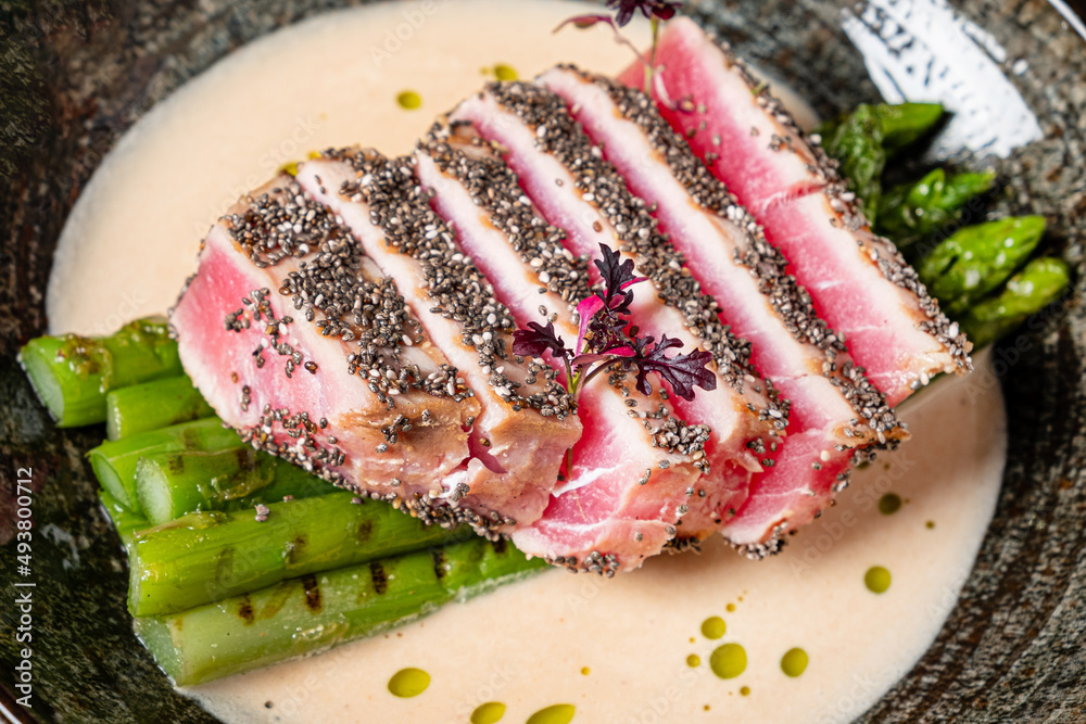 tuna steak with asparagus and sauce tuna steak with asparagus and sauce