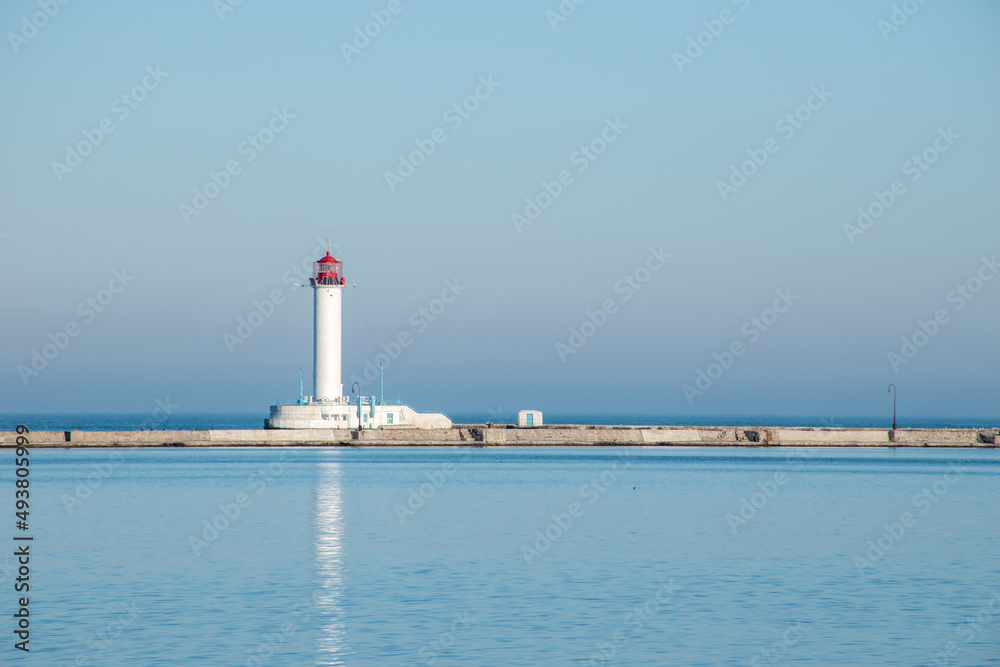 Lighthouse in sea port in Odessa Ukraine in the winter