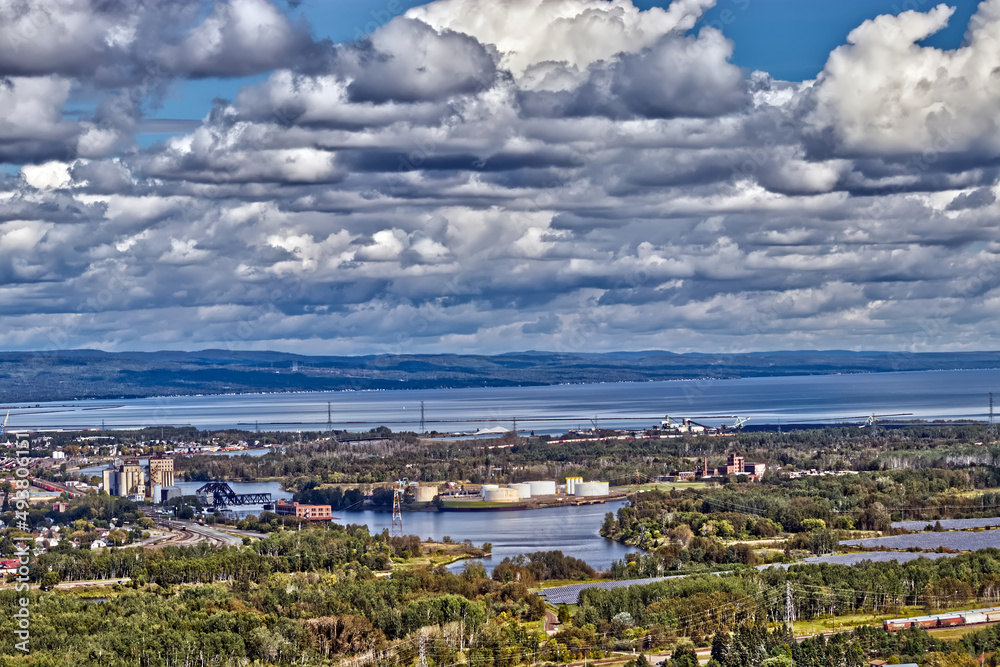 Ports, factories, roads , hills, and the Lake Superior under the clouds - Thunder Bay, Ontario, Canada