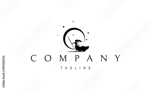 Vector logo on which an abstract image of an amazon with a spear on the background of a crescent moon.