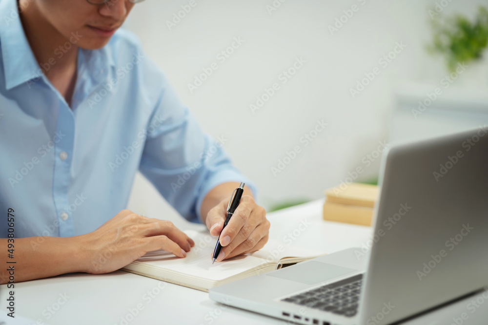 Fototapeta premium Business Professional Accountant man working on laptop computer making research for planning startup at desktop working process in office