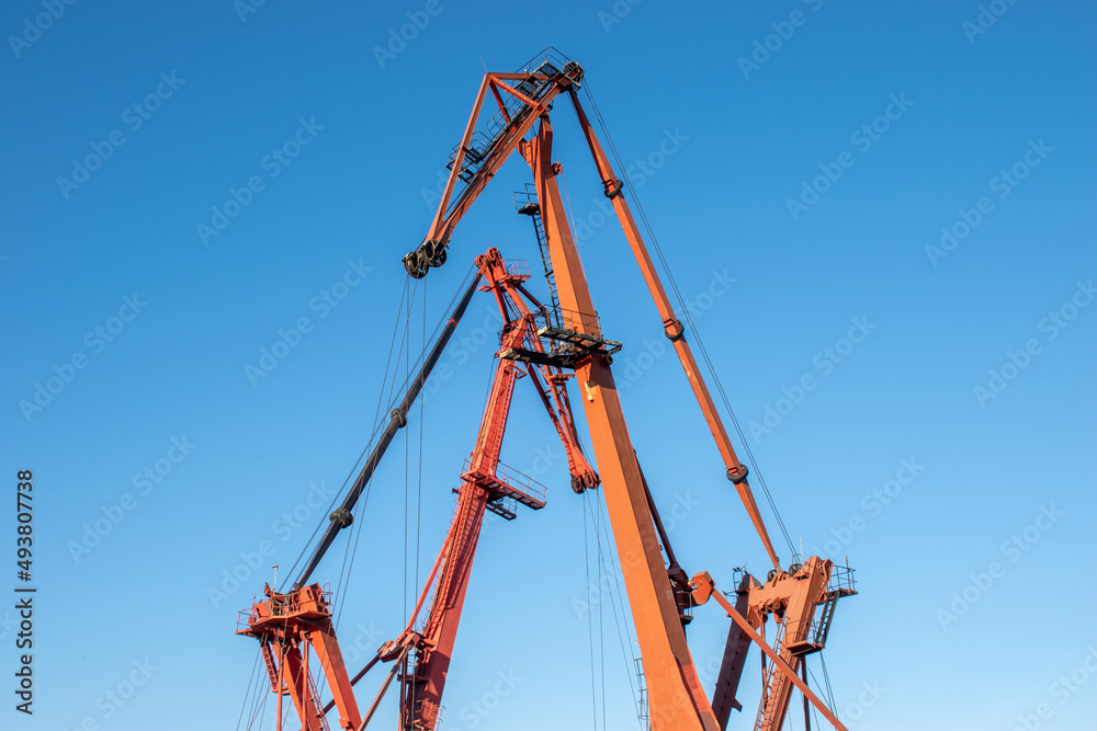 Steel structure of new industrial building under cloud blue sky Steel structure of new industrial building under cloud blue sky