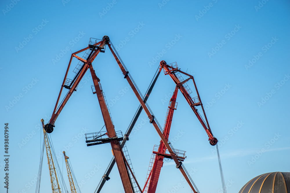 Steel structure of new industrial building under cloud blue sky Steel structure of new industrial building under cloud blue sky