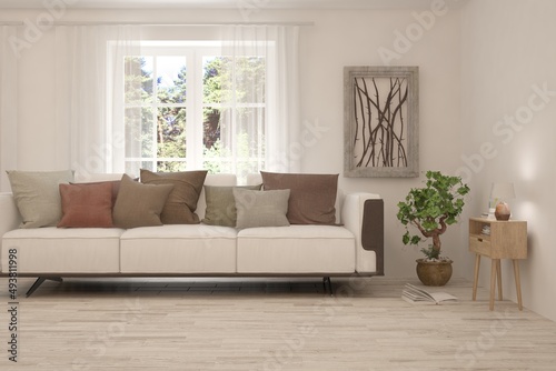 Minimalist living room in white color with sofa and summer landscape in window. Scandinavian interior design. 3D illustration © AntonSh