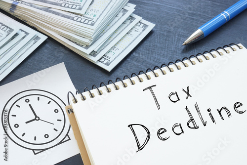 Tax Deadline is shown on the photo using the text dollars and picture of clock