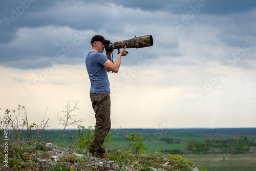 Wildlife photographer in summer time