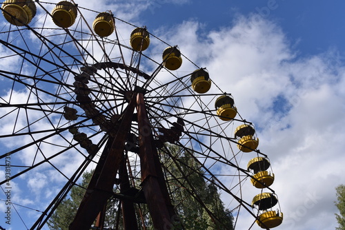 Feeris wheel in abandoned amussement park in Pripyat near Chernobyl power station in Ukraine. 