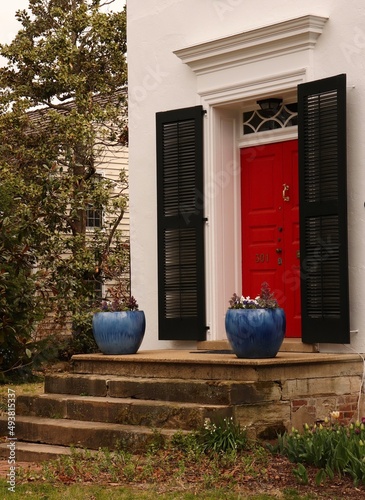 Red Door, Black Shutters, Blue Flowerpots © Loraine