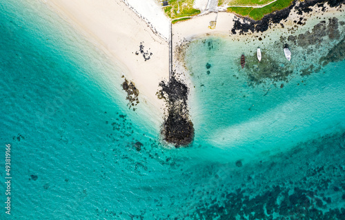 Aerial view of a pier located on the south east coast of Mauritius at Pointe d'Esny Beach