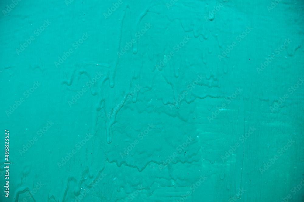 Old green metal background. Uneven surface and texture.