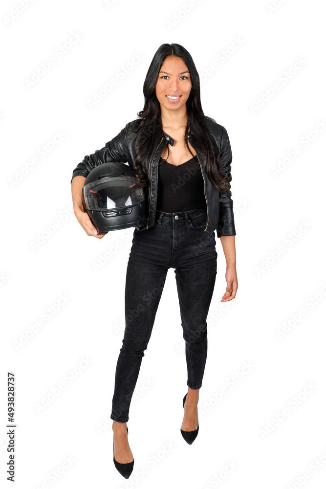 Happy motorcyclist woman, wearing a leather jacket, holding a helmet. Smiling looking at camera. Isolated on white background. 20-22 years old asiatic woman. BIKER WOMAN CONCEPT Happy motorcyclist woman, wearing a leather jacket, holding a helmet. Smiling looking at camera. Isolated on white background. 20-22 years old asiatic woman. BIKER WOMAN CONCEPT