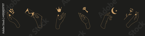Collection of mystical objects in female hands. Silhouettes of female hands holding symbolic objects. A key, an envelope with a letter, a crown, a flower, a young moon.