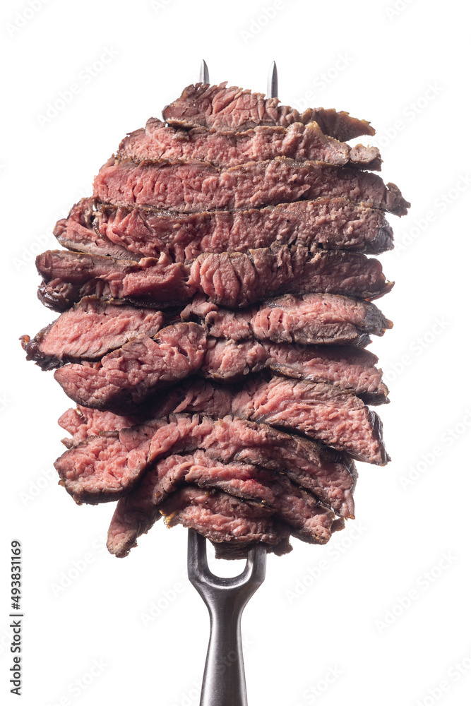 slices of a steak on white background