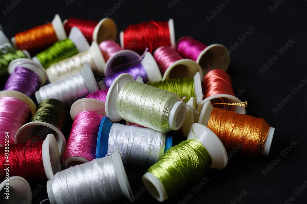 close-up colorful bobbin threads,handcrafted bobbin threads, close-up colorful bobbin threads,handcrafted bobbin threads,