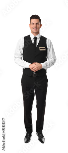 Full length portrait of happy receptionist in uniform on white background