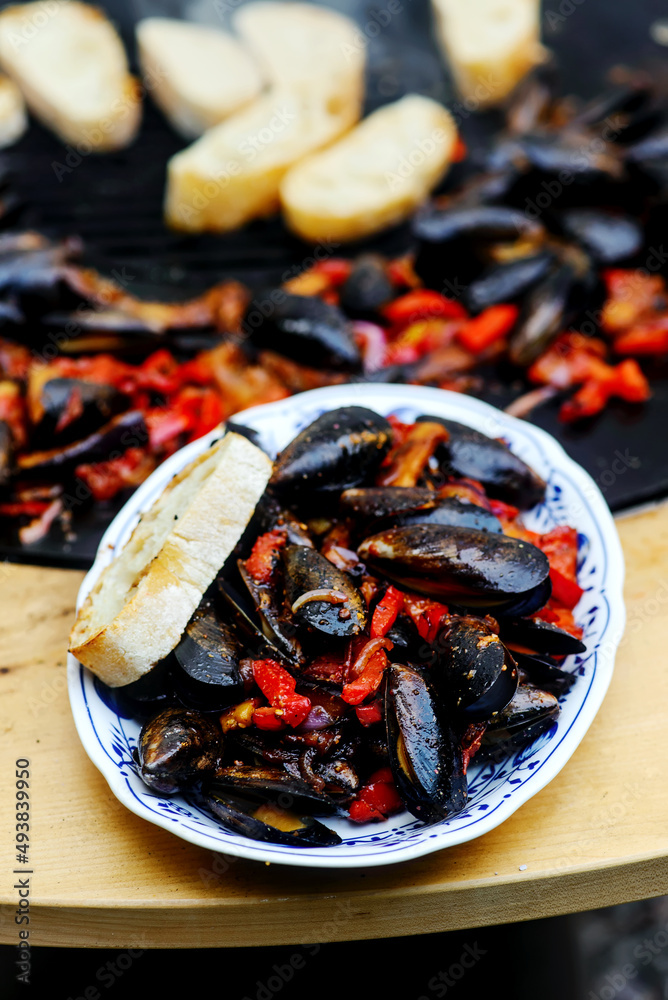 Grilled Catalan mussels.outdoor grilling Grilled Catalan mussels.outdoor grilling