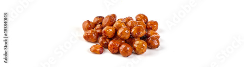 Roasted Hazelnuts with caramel, isolated on white background.