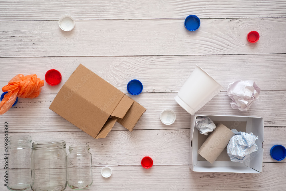 Separate collection and sorting of garbage at home. Glass and plastic and paper for recycling Separate collection and sorting of garbage at home. Glass and plastic and paper for recycling