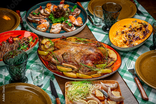 Baked duck with apples on the festive table