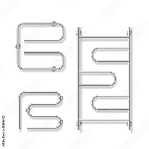 Towel rails for home bathroom and toilet room. Dryer with steel pipes, chrome radiators