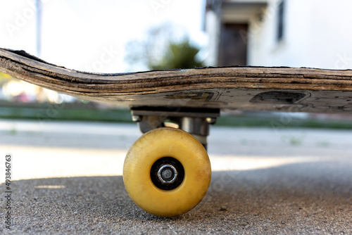 Close up of old wood skateboard