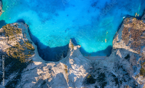 Aerial seascape at the day time. Bay and rocks. Blue water background in the ...