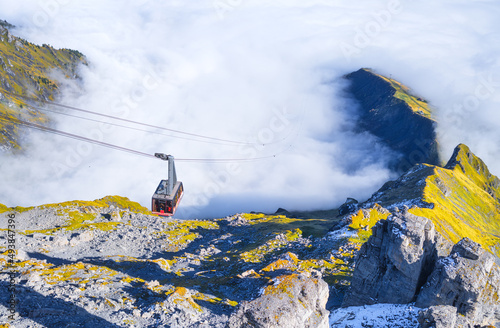 Cableway in the mountains. Transportation. The cable car descends into the mo...
