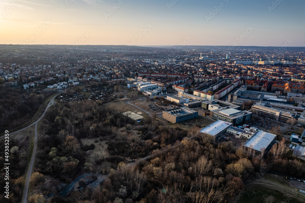 Obraz premium Drone view of buildings and a forest near Dresden