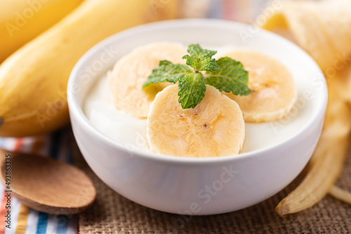 Yogurt with banana in bowl, Healthy eating