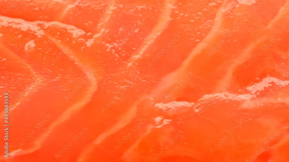 Salmon fish .Fresh red fish.Fish red texture close-up.Seafood and fish. Protein nutrition. Omega three fatty acids source. Healthy diet. 4k footage Salmon fish .Fresh red fish.Fish red texture close-up.Seafood and fish. Protein nutrition. Omega three fatty acids source. Healthy diet. 4k footage