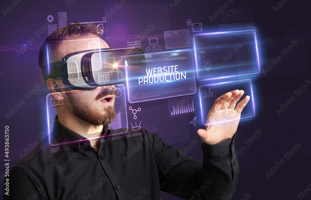 Businessman looking through Virtual Reality glasses, tech concept Businessman looking through Virtual Reality glasses, tech concept