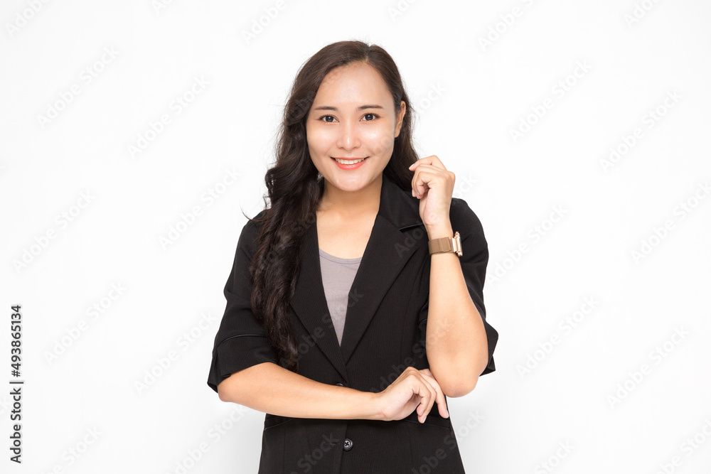 Beautiful Asian business woman wearing black suit with her crossed arms on white background and copy space. Confident Asian working woman smiling and cheerful Beautiful Asian business woman wearing black suit with her crossed arms on white background and copy space. Confident Asian working woman smiling and cheerful