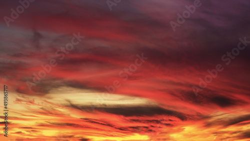 Colorful sky and clouds at sunset or sunrise suitable for background or sky substitution use. High Resolution. © Rix Pix